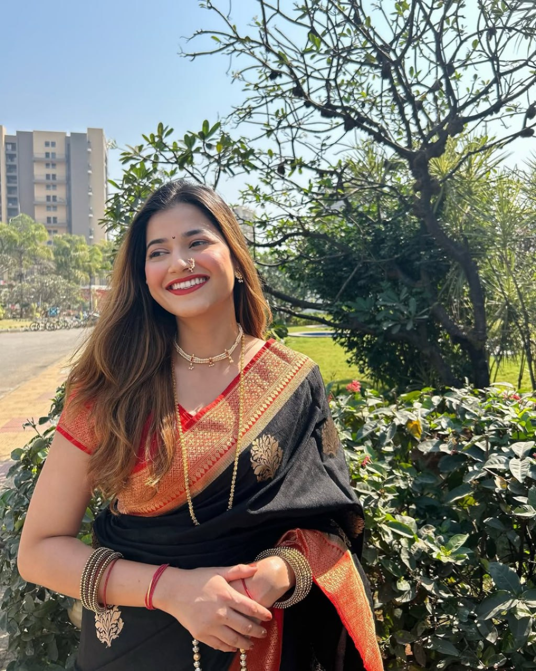 Varnika - Black Saree with Rust Orange Zari Border