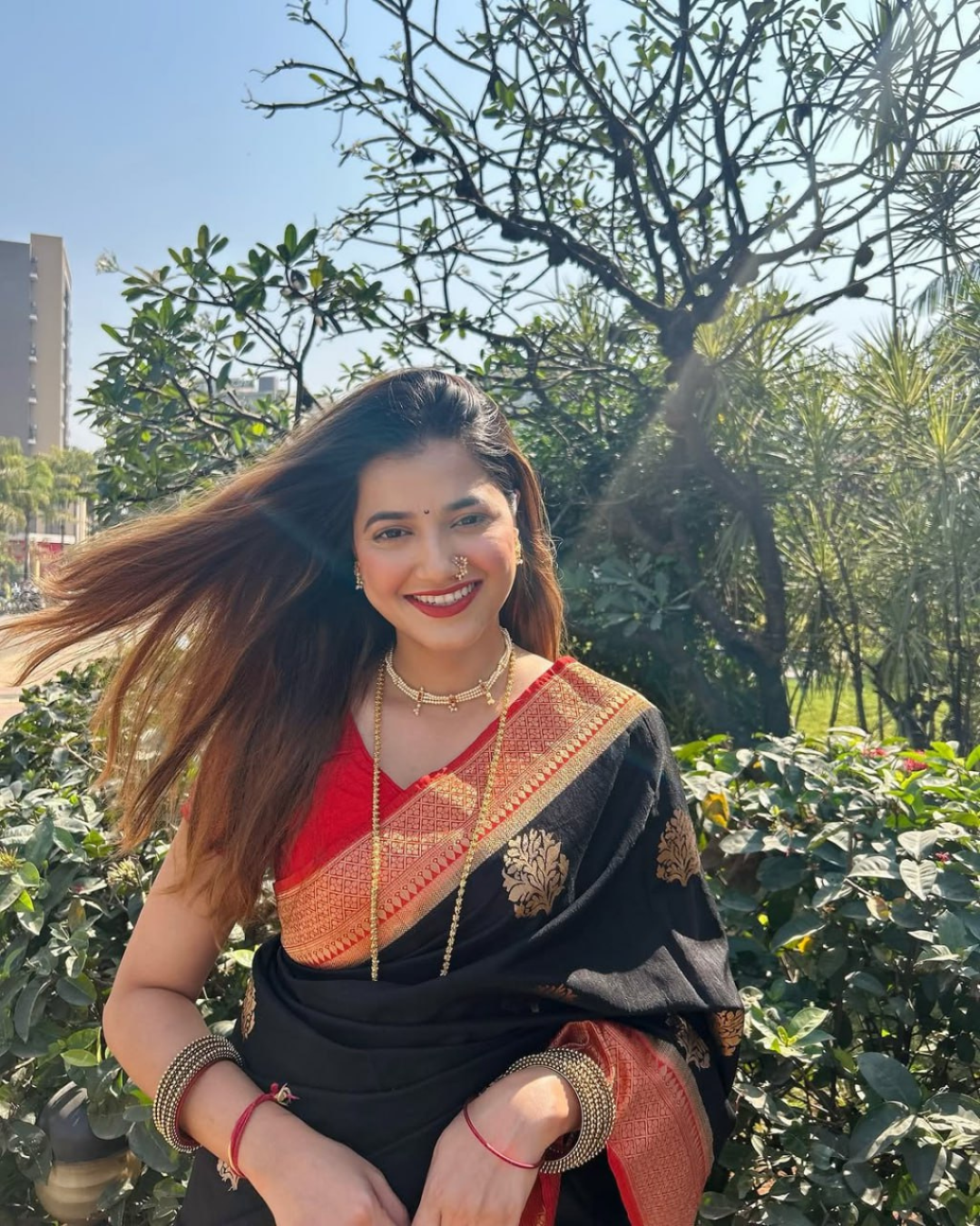Varnika - Black Saree with Rust Orange Zari Border