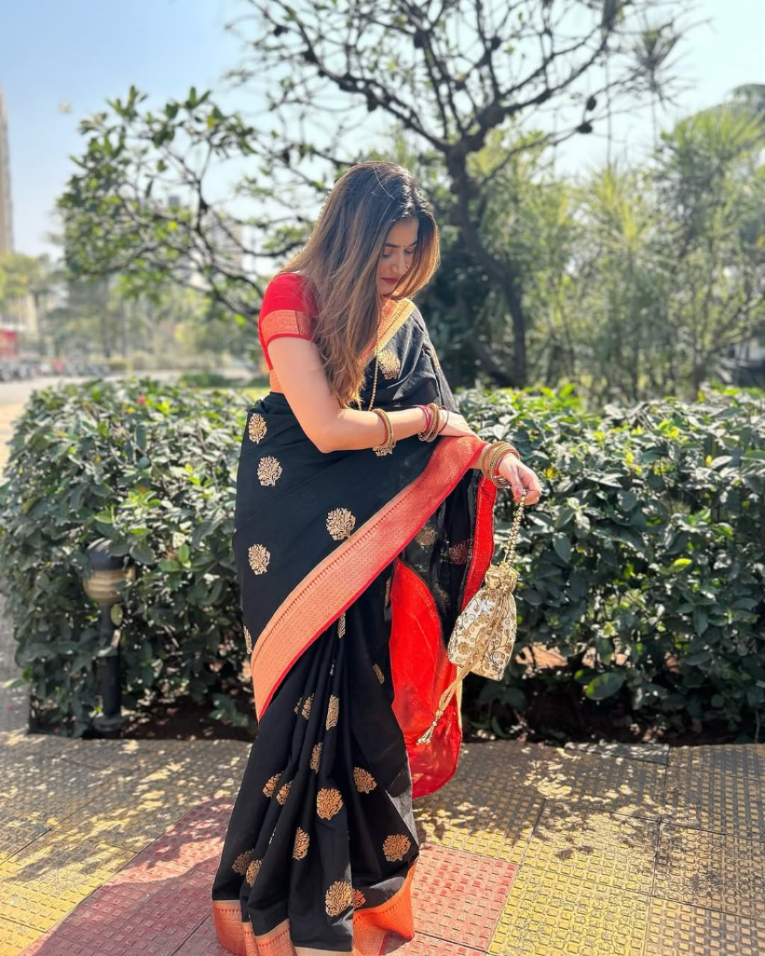 Varnika - Black Saree with Rust Orange Zari Border