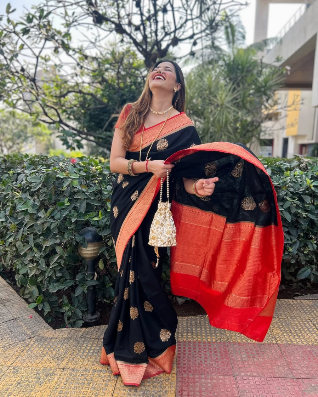 Varnika - Black Saree with Rust Orange Zari Border
