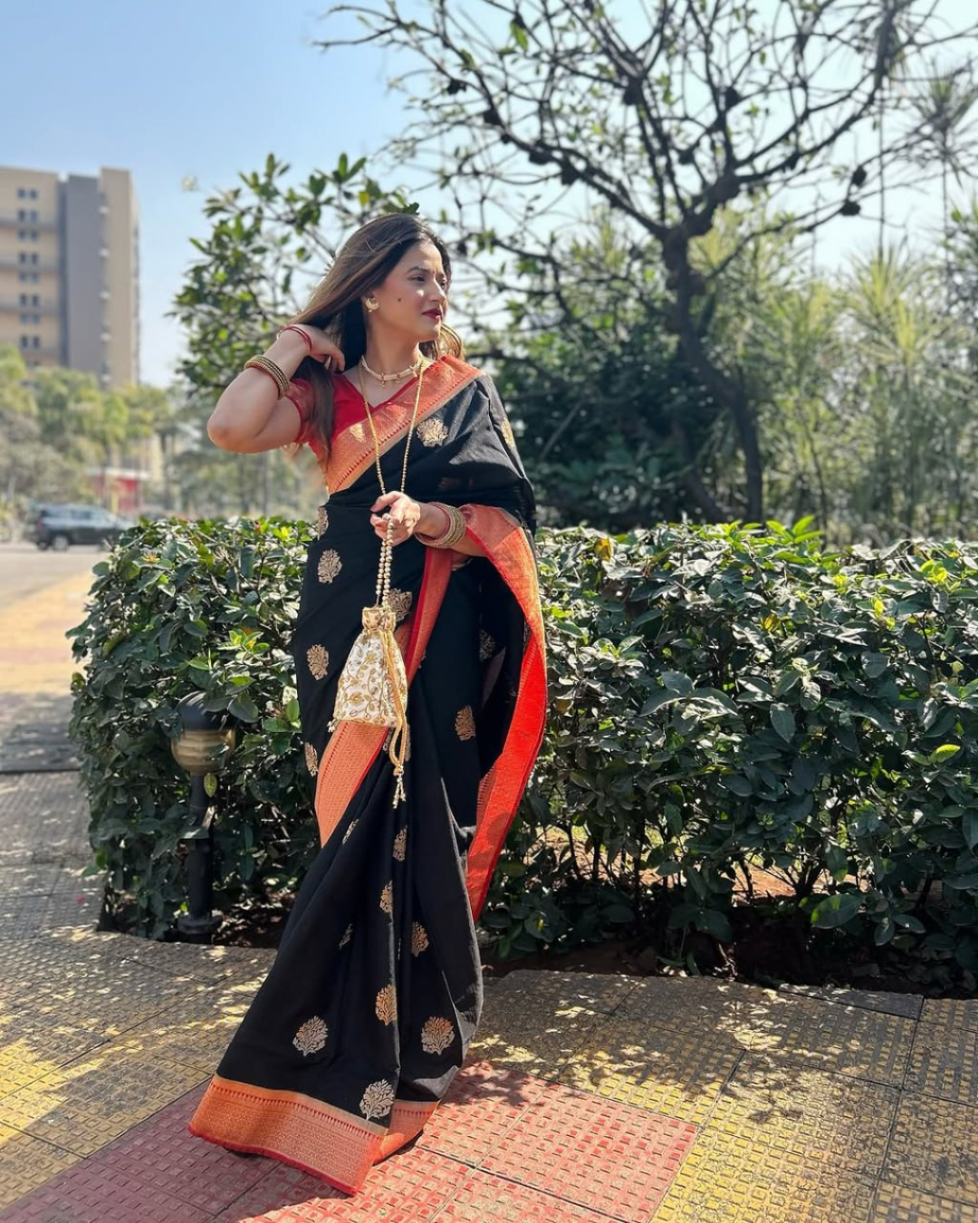 Varnika - Black Saree with Rust Orange Zari Border